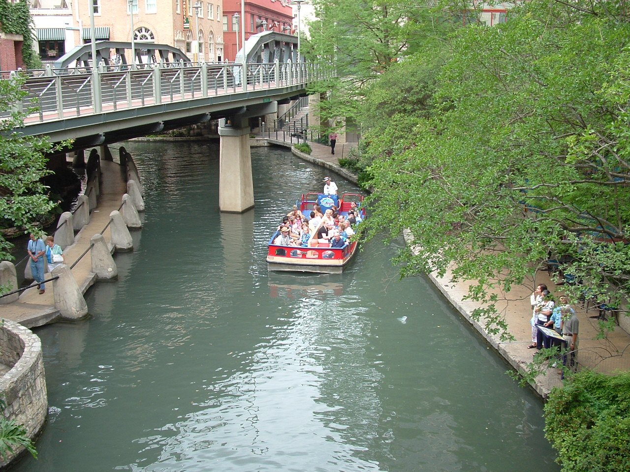The San Antonio River Walk lined with restaurants and shops, Texas
